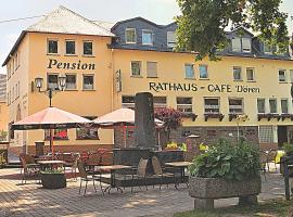 多伦膳食公寓酒店，位于布鲁蒂格-凡克尔的酒店