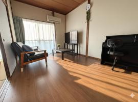 Omuta Cozy Stay，位于Ōmuta的酒店