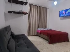 Apartamento tipo estúdio no Centro de Bertioga, Wi-Fi, Vaga, Churrasqueira, a 3 min de carro da praia e balsa