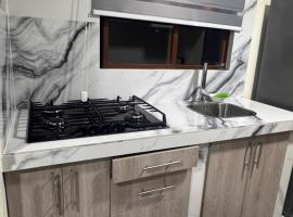 Suite ejecutiva con Parqueo Privado，位于拉塔昆加的自助式住宿