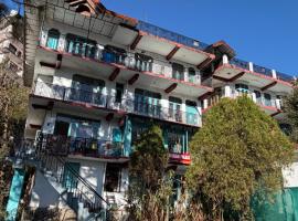 Freedom Palace Hotel，位于达兰萨拉的酒店
