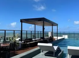 Flat a 20 metros da praia