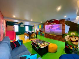 Retro Gaming Corner - Arcade Games - Jacuzzi - Sauna - Switch 2，位于Courcelles的酒店