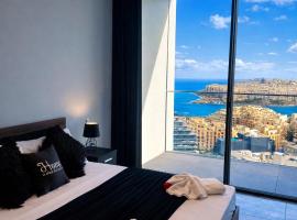 Whispering Waves at Mercury Tower with panoramic view , 2X pools and Gym，位于帕切维拉的酒店