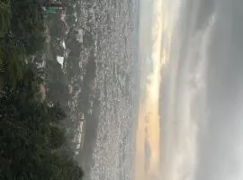 Perched on a mountain top, breathtaking city view