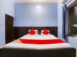 OYO Om Hotel，位于尼玛纳的酒店