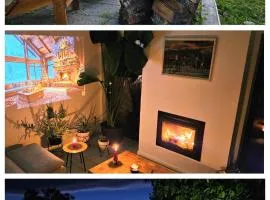 Black Walnut House with indoor outdoor fireplace