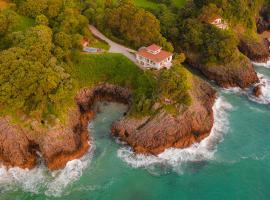 Wishome- Impresionante casa sobre el mar con piscina privada para un verano más suave，位于佩琼的酒店