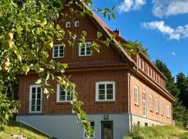 Berghaus über dem See - Herberge im Hoff Schawernack