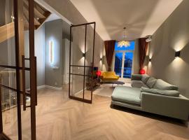 Prachtige monumentale bovenwoning, hartje haarlem，位于哈莱姆的酒店
