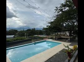 Hermosa casa campestre，位于布加的酒店