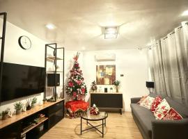Cozy 2BR House Digos With Bath Tub & Karaoke，位于Digos的酒店