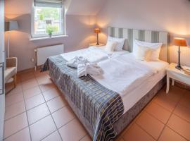 Hotel Hüttmann，位于诺尔多夫的酒店