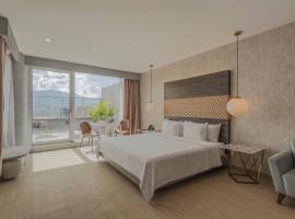 V Grand Hotel, a member of Radisson Individuals，位于麦德林的酒店