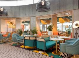 巴黎戴高乐机场诺富特酒店，位于鲁瓦西昂法兰西的酒店