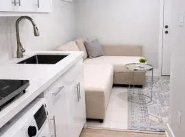 Studio Basement Suite with Sofa Bed and kitchen, Entrance from Garage