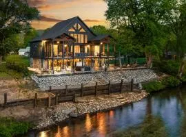 Highly Rated New Riverfront Cabin Full of Windows Hot Tub Pool Table Sleeps 12