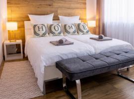 Gelbe Koffer - Design-Apartment in Schiffweiler - 2 Parkplätze - Self-Check-in - ruhig & naturnah，位于Schiffweiler的酒店