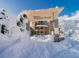 Snow City's Montana Blues Resort Manali - Heated & Air-Cooled Stay，位于马拉里的酒店