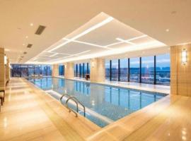 The QUBE Hotel Jingzhou，位于Caoshi的酒店