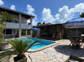 Canto da Ita, Casa e Pousada, 250 m da praia com piscina e churrasqueira，位于伊塔马拉卡的酒店