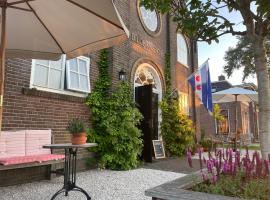 Kerkhotel Bij De Pastorie，位于Reitsum的酒店