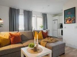 Guestly Homes - Homely 1BR Business Apartment