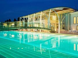 海滨高尔夫度假酒店，位于圣乔瓦尼-因马里尼亚诺米萨诺世界赛道附近的酒店