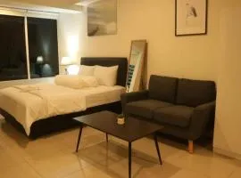 Apartemen Grand Kamala Lagoon by Cheapin Room