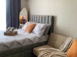 Condo with free pool access and WiFi, near Mactan Airport and Beaches