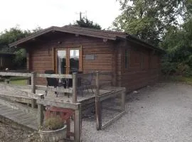 Hand built log cabin at Avonvale Holiday Lodges