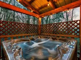 Private Wooded Cabin w Hot Tub, Fire Pit & Arcade