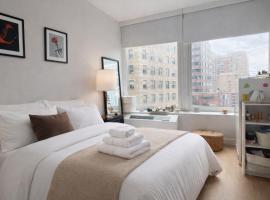 Modern 2BR Apartment in Financial District - Full Kitchen，位于纽约的酒店