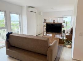 Monoambiente moderno con balcón, piscina en Luque，位于Luque的酒店