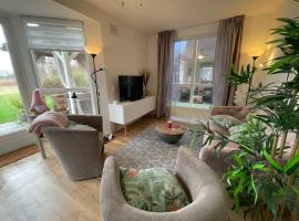 Gezellige vakantiewoning aan het water in Ewijk - recreational only no workers，位于Ewijk的酒店