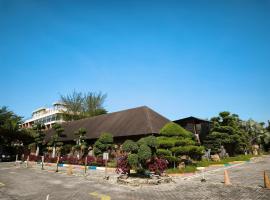 Thong's Inn Hotel Kualanamu，位于棉兰的酒店