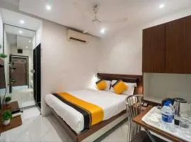 Glitz Rexton Inn - Near IIT Powai