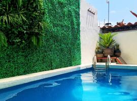 descanso ideal con alberca，位于Cihuatlan的酒店