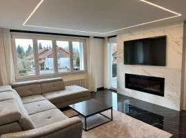 Modern 3BR Apartment with Fireplace, Miele Kitchen and Balcony