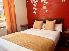 Hostal Green Garden en el centro de Baños de Agua Santa，位于巴尼奥斯的酒店