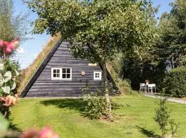 Unieke plaggenhut in Drenthe met bedstee & uitzicht op wijngaard
