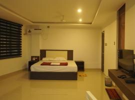 Grand Munnar Rooms，位于蒙纳的酒店