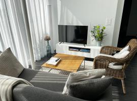Modern apartment Pilatus view self check-in，位于施坦斯的酒店