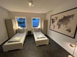 Work & Stay - Monteurzimmer - nahe Werft und Hochbrücke mit Stellplatz für Transporter