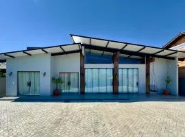 Casa de praia com espaço gourmet