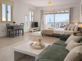 Apartment in Peaceful Village with Pool, Balcony Hillside and Sea Views