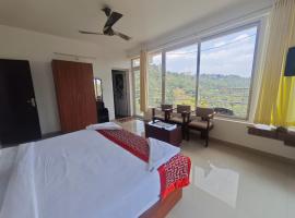 Holidayz by Stayz Royale Munnar - Misty & Sunrise Experience，位于蒙纳的酒店