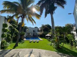 Casa de descanso, alberca, asador, jardín, 15 huéspedes，位于特米斯科的酒店