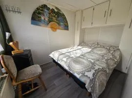 Chalet bij Opa en Oma, huiselijke gezelligheid in bosrijke omgeving!