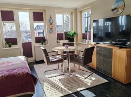 Haus Blaue Welle App 13 inkl Strandkorb in der HS，位于赛巴特班森的酒店